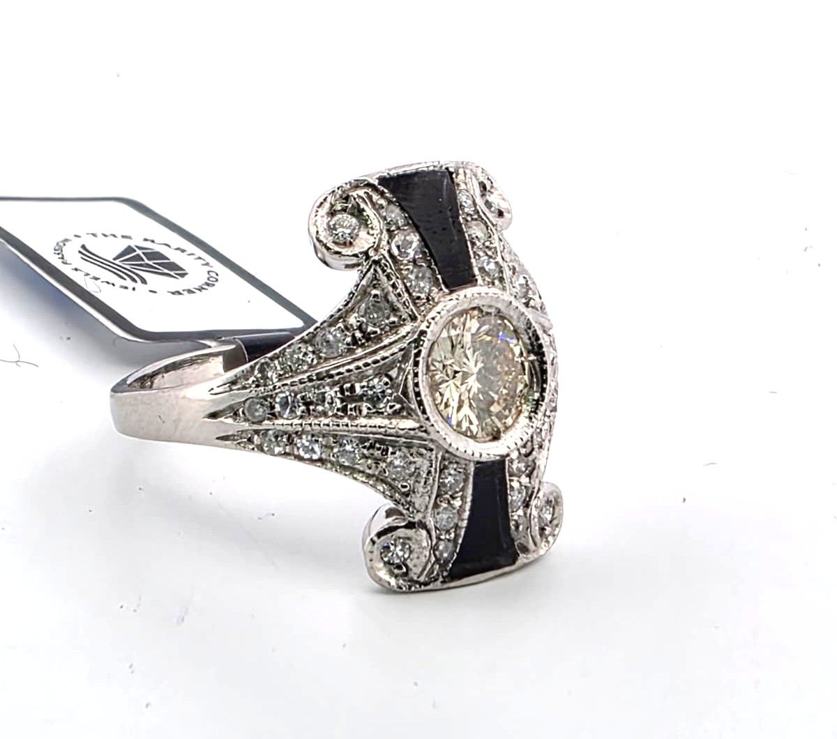 1983 H Anello in platino con diamante importante centrale e diamanti