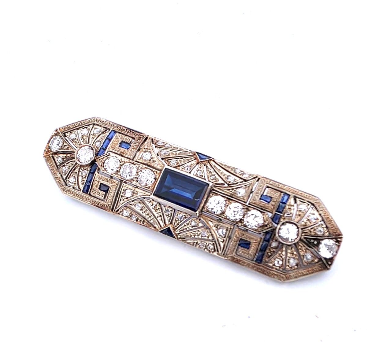 Spilla anni '40 in oro bianco 18kt con zaffiri e diamanti