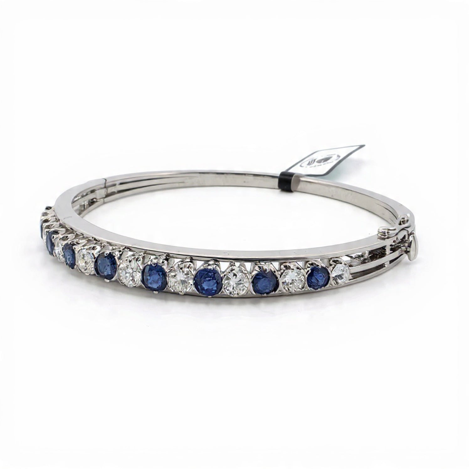 Bracciale rigido in oro bianco 18kt con zaffiri e diamanti