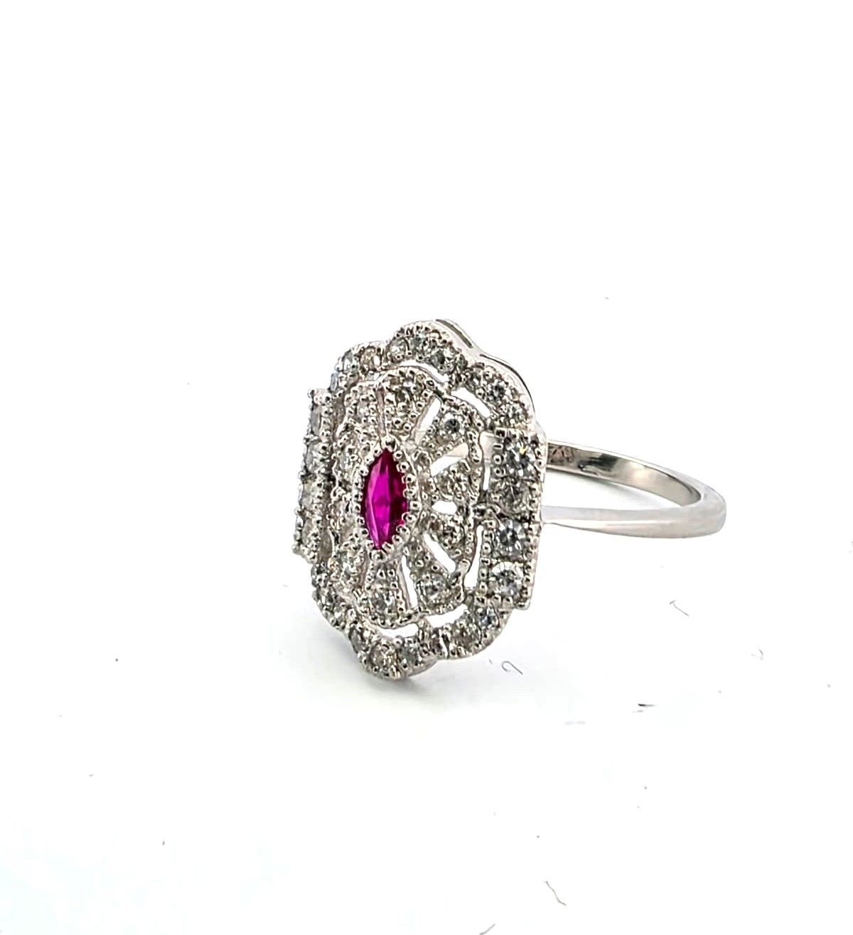 Anello in platino con rubino e diamanti