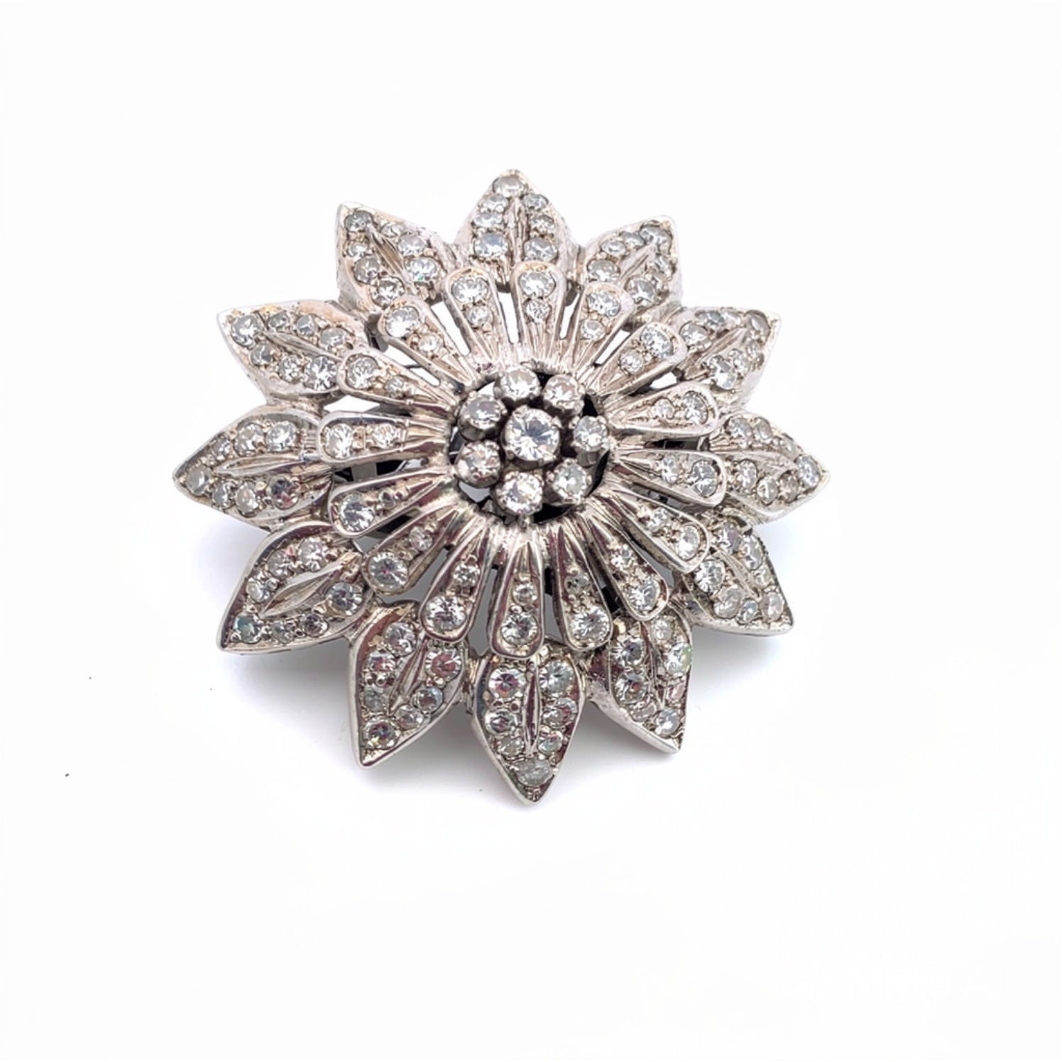 Spilla in oro bianco 18kt con diamanti
