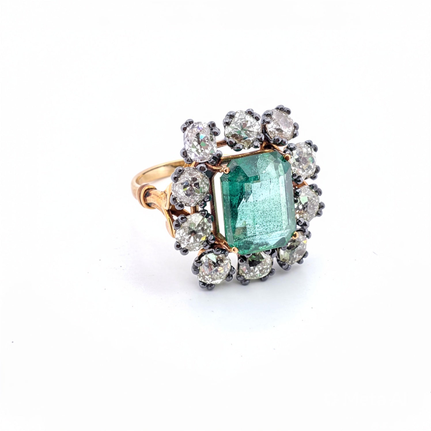 Anello in oro giallo 18kt e argento con diamanti e smeraldo