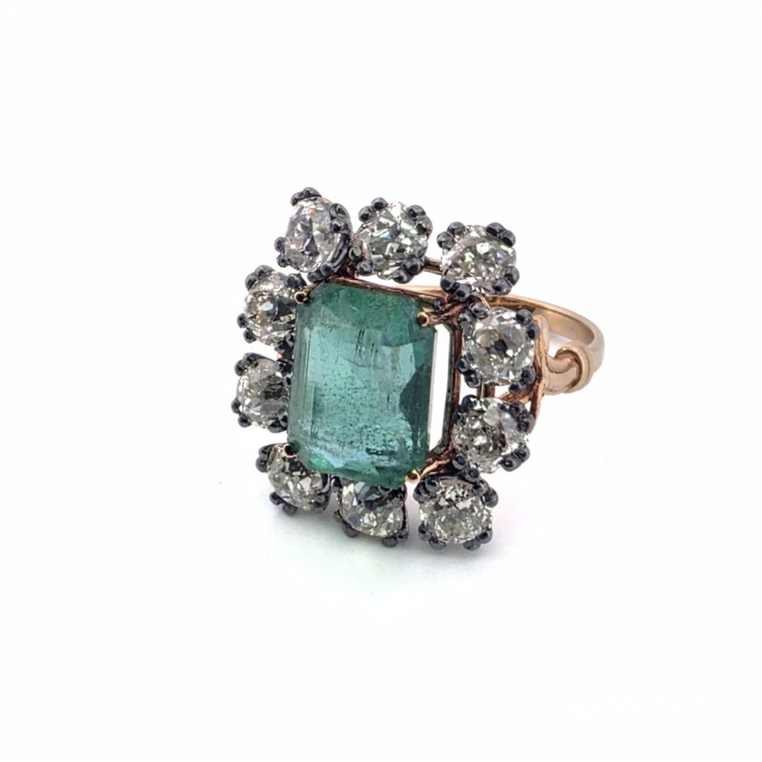 Anello in oro giallo 18kt e argento con diamanti e smeraldo